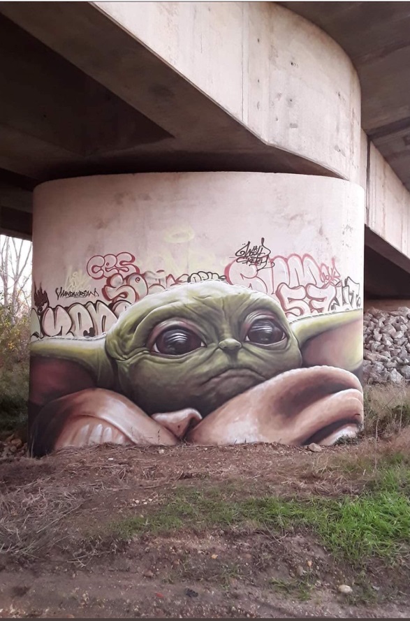 PHOTO Baby Yoda Mural Covering Up Graffiti