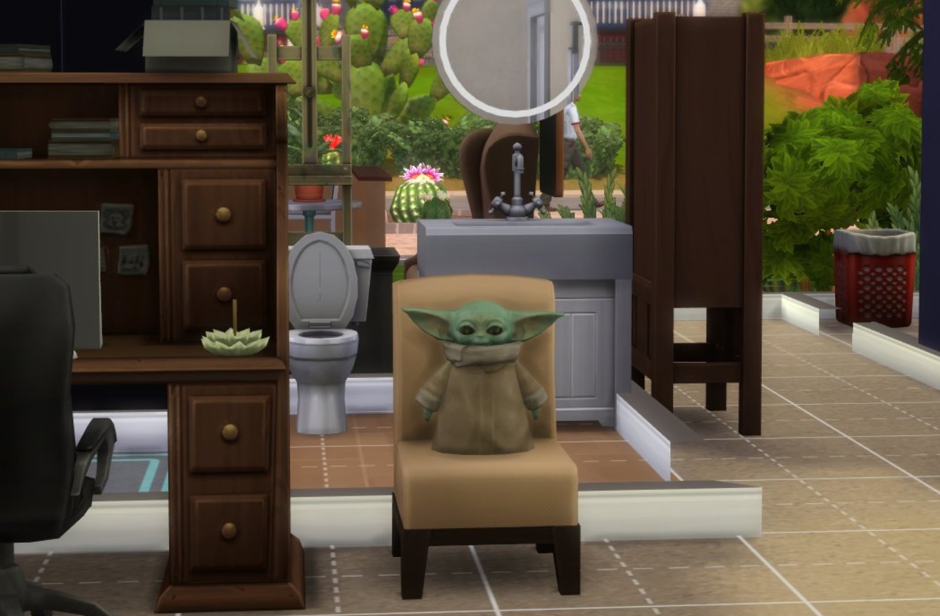 PHOTO Baby Yoda Sitting On A Chair In Sims 2