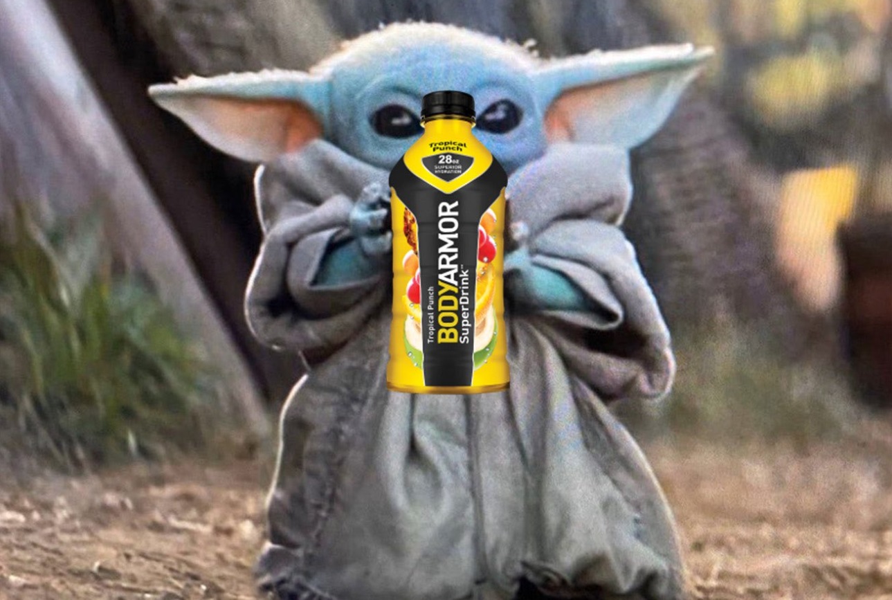 PHOTO Baby Yoda Struggling To Hold Body Armor Because It's So Big