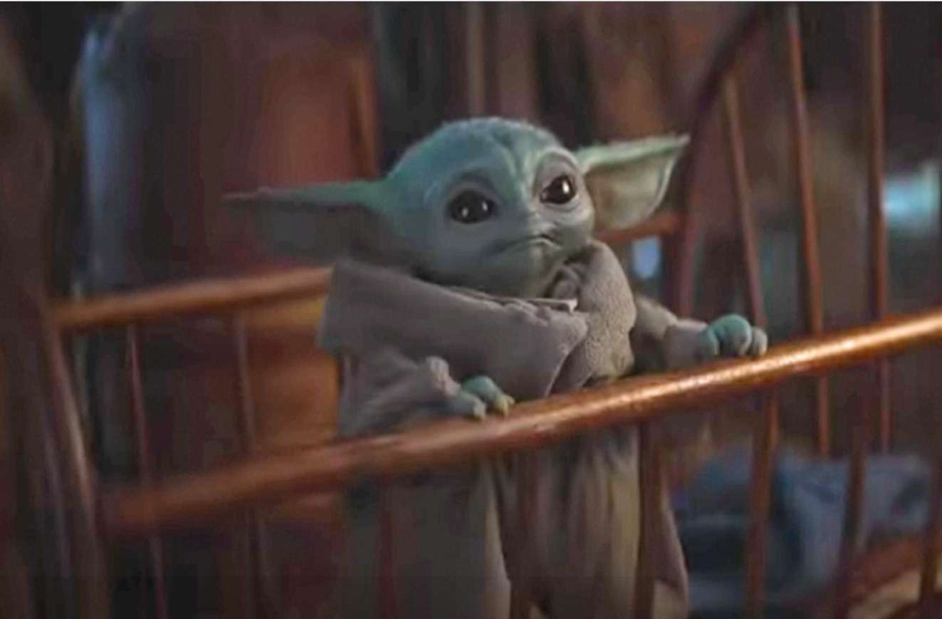 PHOTO Baby Yoda Tapped In A Baby Crib