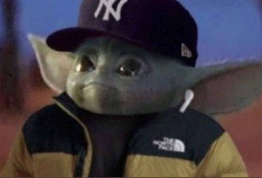 PHOTO Baby Yoda Wearing Yankees Hat And Apple Airpod