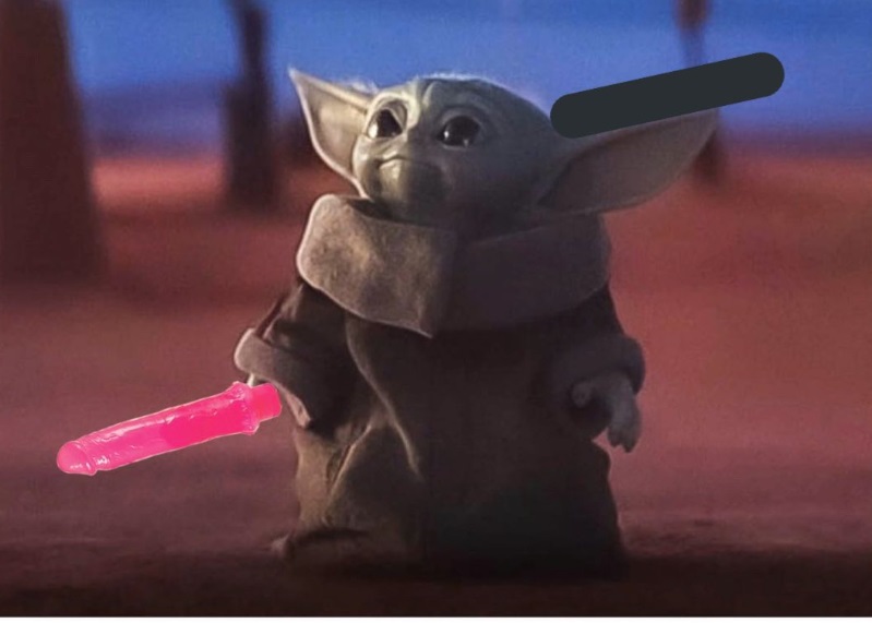 PHOTO Baby Yoda With A Light Stick