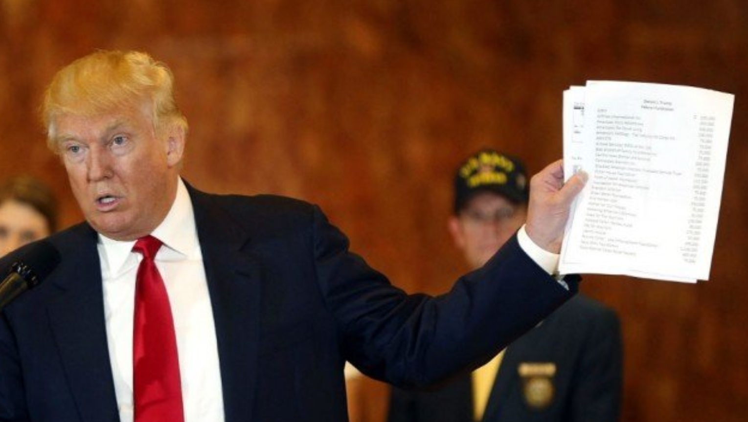 PHOTO Donald Trump Holding Tax Records For Everyone To See