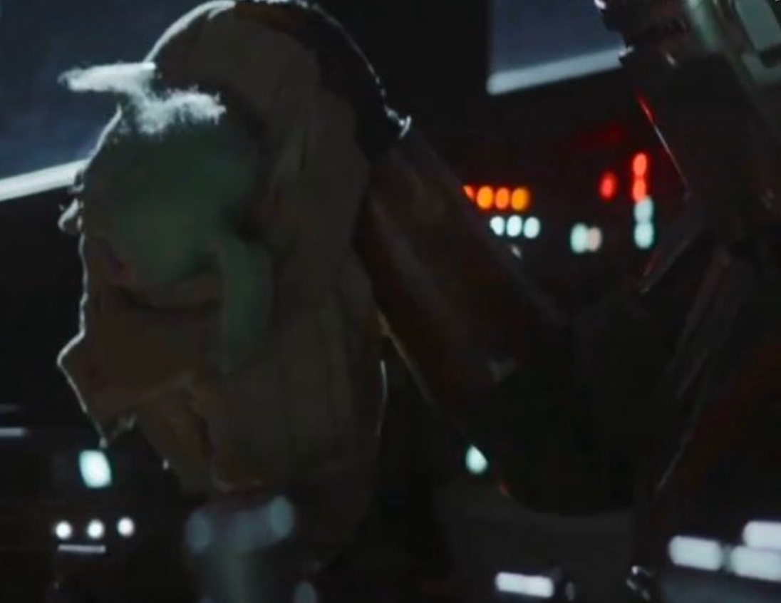 PHOTO Mandalorian Picks Up Baby Yoda Like He's A Stuffed Animal