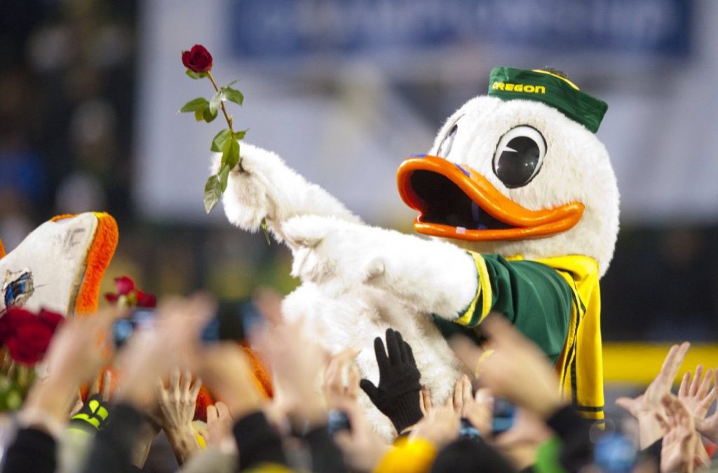 PHOTO Oregon Duck Mascot Holding A Rose As Ducks Make It To Rose Bowl