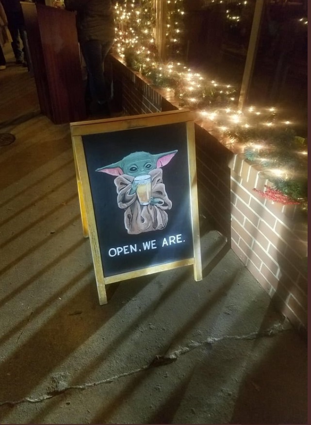 PHOTO Restaurant Has Baby Yoda Drinking Beer Sign That Says Open We Are