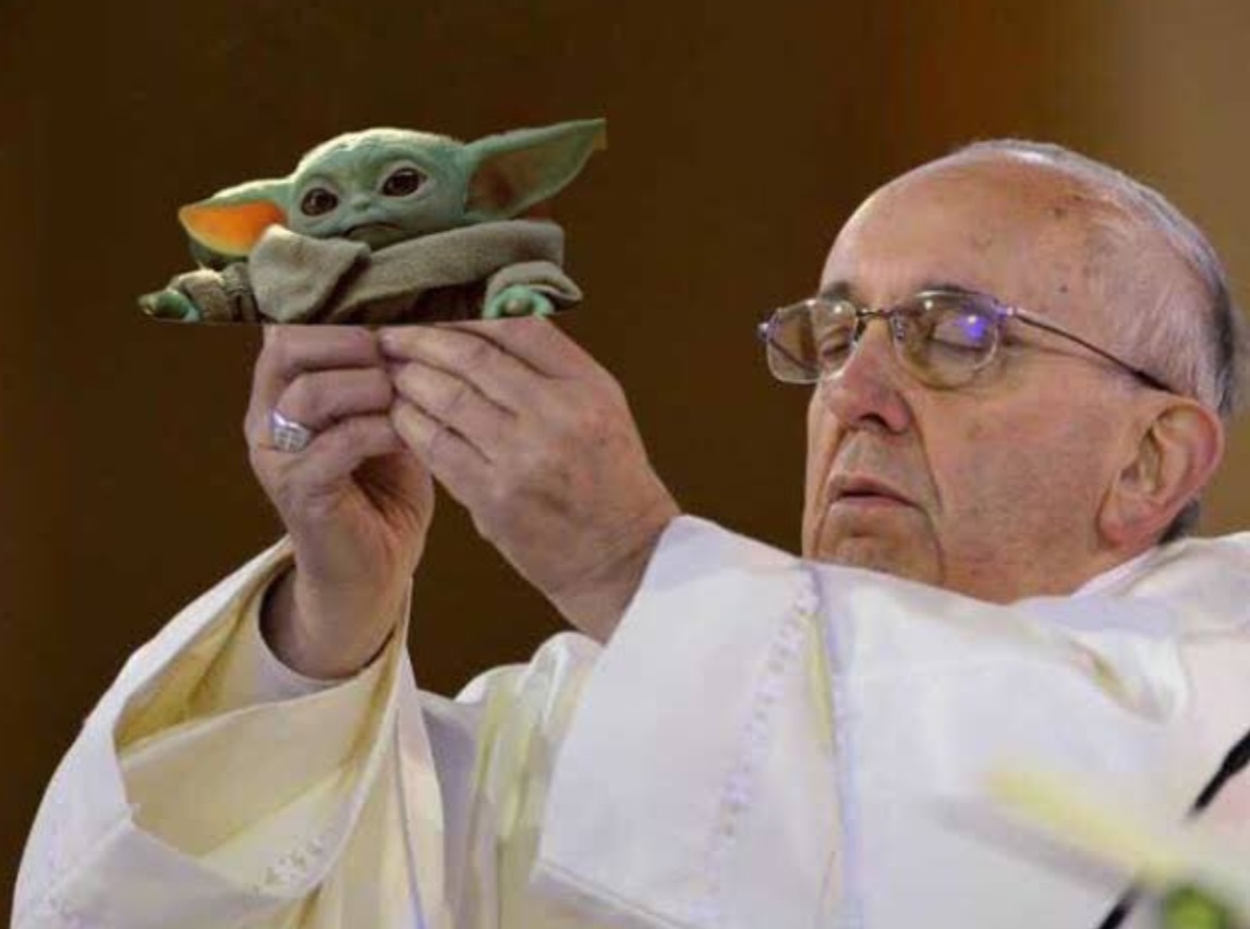 PHOTO The Pope Holding Bady Yoda High In The Air