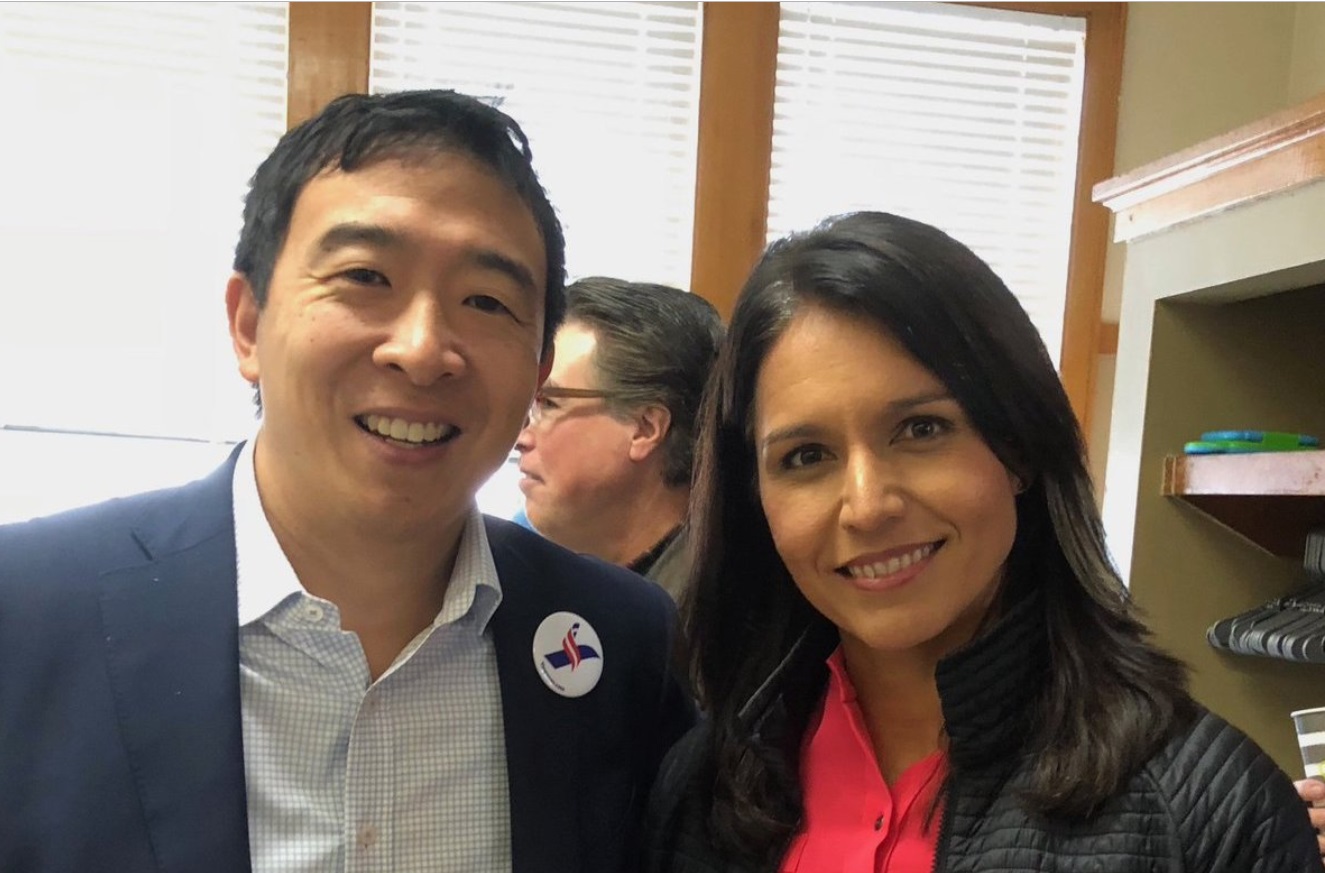 PHOTO Tulsi Gabbard Gets Close To Andrew Yang For Picture