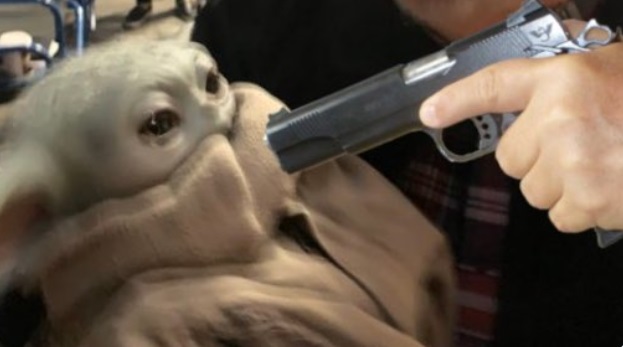 PHOTO A Gun To Baby Yoda's Head