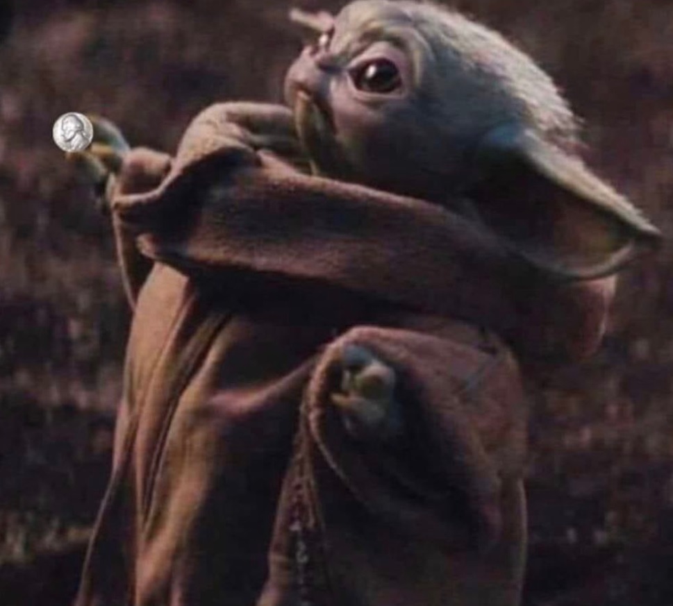 PHOTO Baby Yoda Holding A Nickel