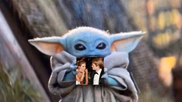 PHOTO Baby Yoda Looks Hilarious Holding “Miss Americana & The Heartbreak Prince” By Taylor Swift