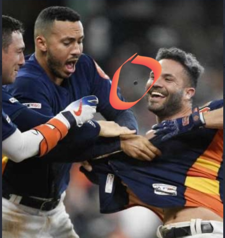 PHOTO Black Buzzer Device Flies Out Of Jose Altuve's Uniform Celebrating After Astros Win World Series