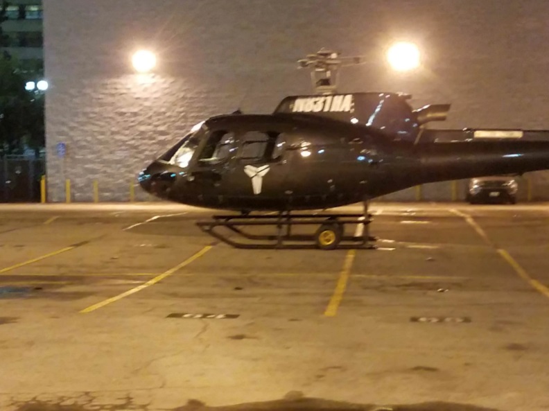 PHOTO Kobe Bryant's Helicopter Parked In Regular Parking Lot On Spring And 3rd Street In Los Angeles