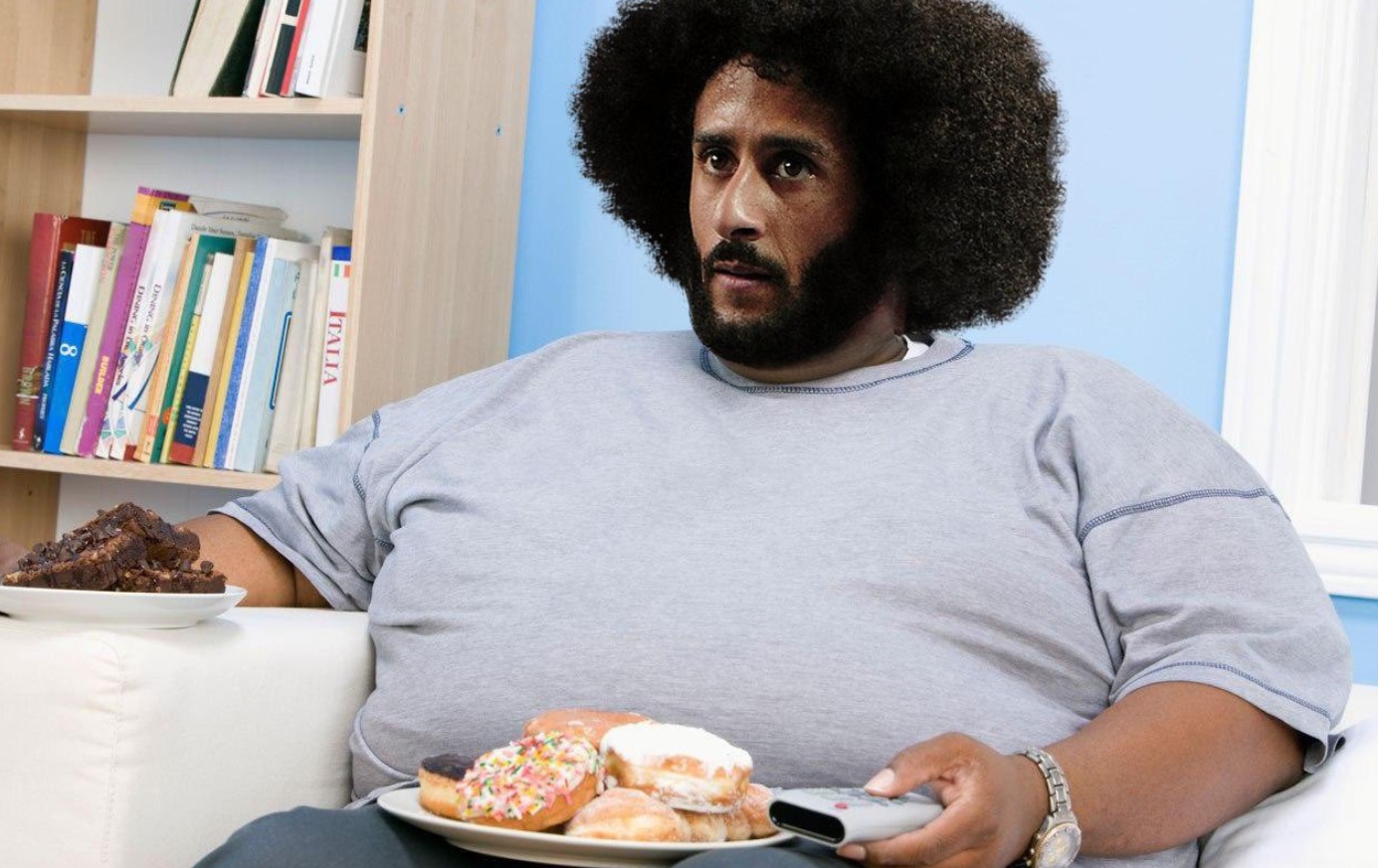 PHOTO Fat Colin Kaepernick Watching Super Bowl With Donuts