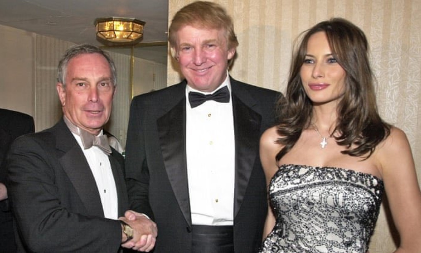 PHOTO Melania Trump Looking Smoking Hot With Upside Cross Necklace Standing Next To Mike Bloomberg