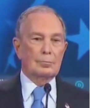 PHOTO Michael Bloomberg Looking Content After Democratic Candidates Leave Him Alone And Start Arguing Amongst Themselves