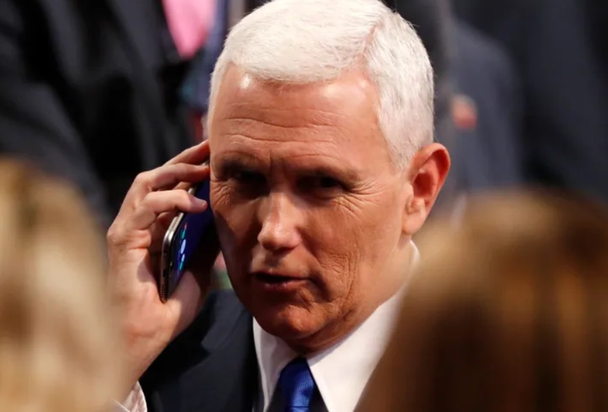 PHOTO Mike Pence Talking On His Flip Phone