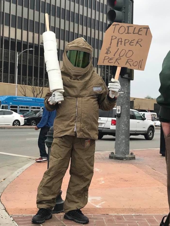 PHOTO Guy Walking Around NJ With A Sign That Says Toilet Paper $100 Per Roll