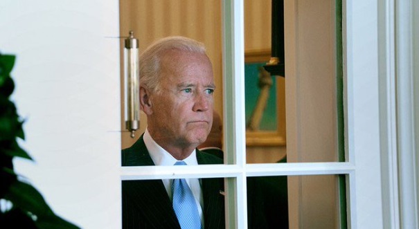 PHOTO Joe Biden Sad Face Looking Out Window Over Corona Virus