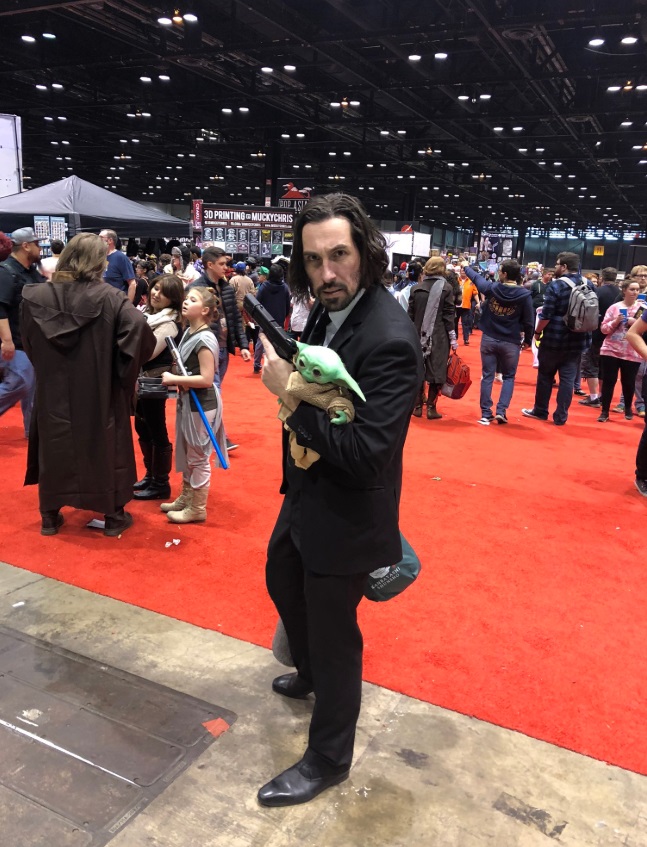 PHOTO John Wick Protecting Baby Yoda With A Pistol