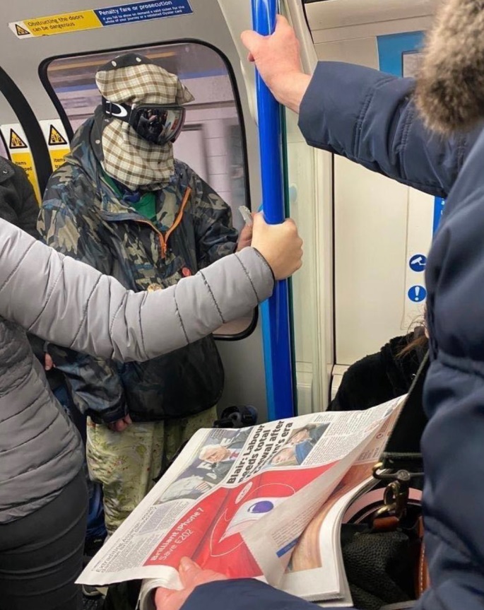 PHOTO New Yorker Taking Subway Wearing Doomsday Mask To Prevent Corona Virus