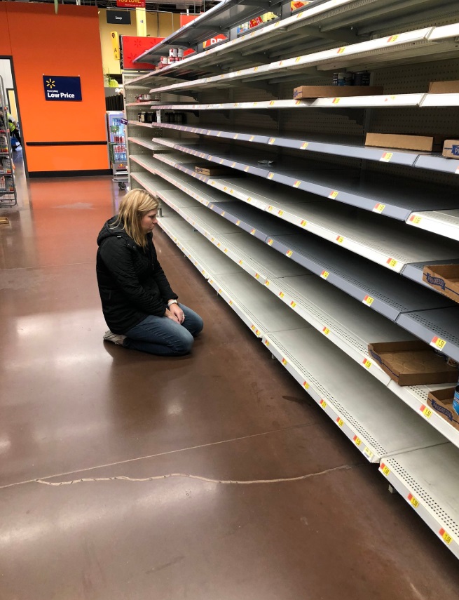 PHOTO News Reporter In Utah Sitting On Floor In Grocery Store Staring At Empty Shelves