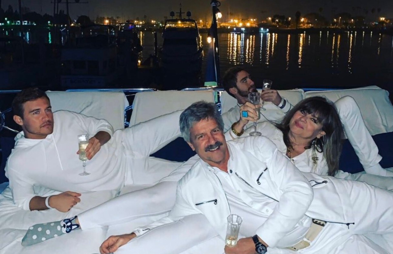 PHOTO Peter From The Bachelor's Family On A Yacht Drinking Wine Wearing All White