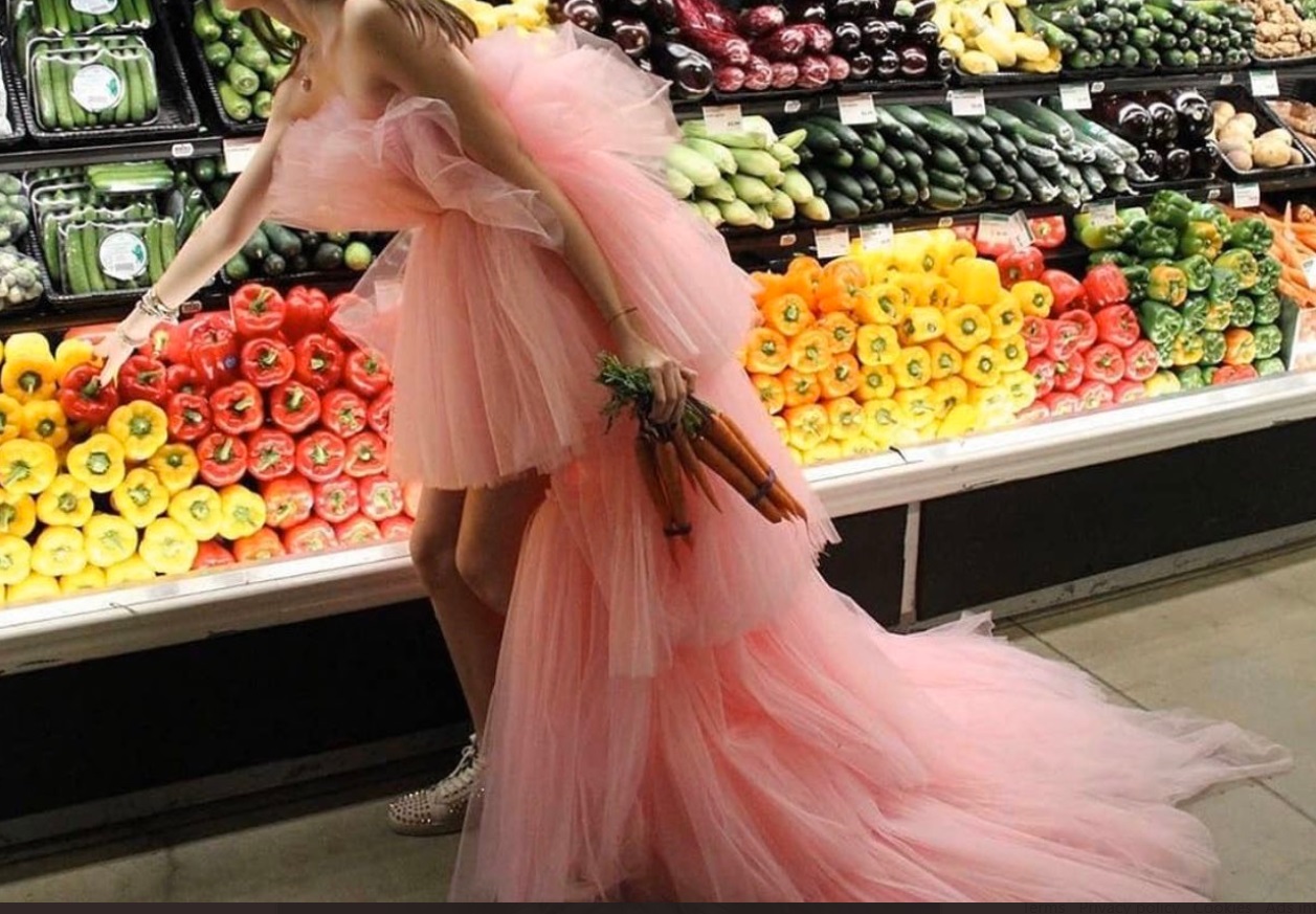 PHOTO Women In Pink Wedding Dress Shopping For Carrots In Produce Isle During Corona Virus Scare