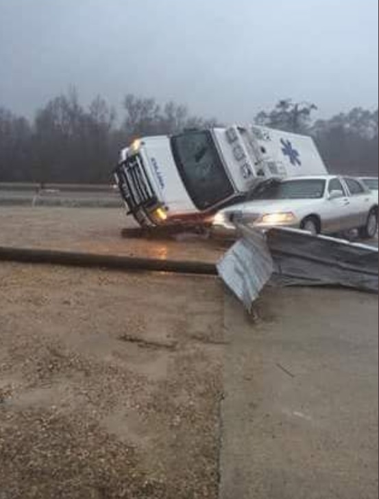 PHOTO Ambulance Flips Into Car After Tornado Hits Laurel Mississippi