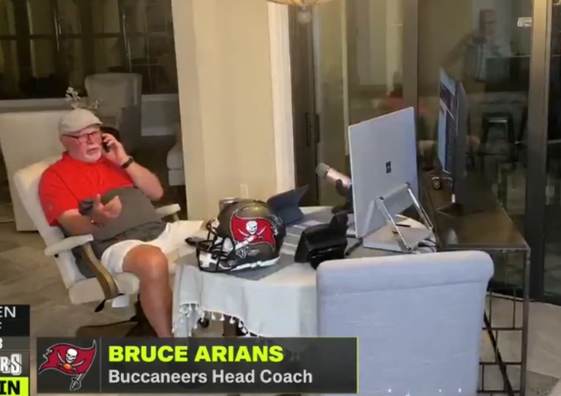 PHOTO Bruce Arians In His Office Looking Like He's Calling His Friends To Come Over To Play Card Games