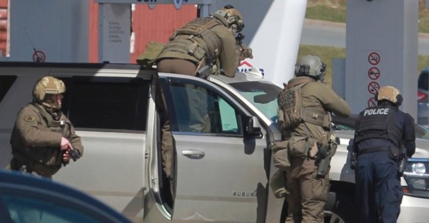 PHOTO Canadian Police With Their Guns Drawn During Active Shooter Incident