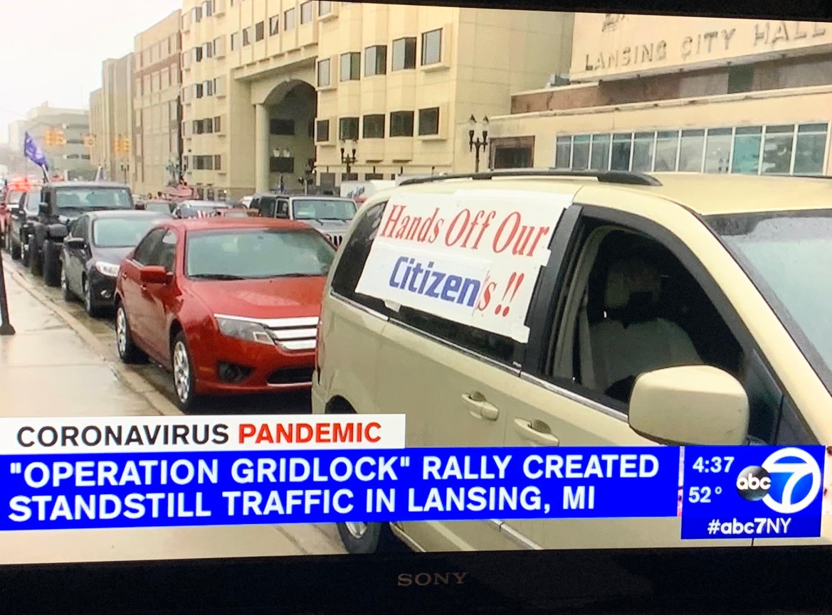 PHOTO Hands Off Our Citizens Sign On Van In Lansing Michigan