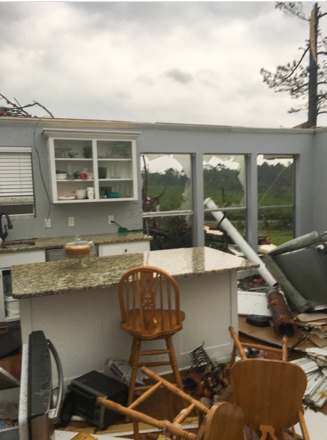 PHOTO House In Laurel Mississippi Damaged By Tornado But Freshly Baked Cake Remained On Counter Top