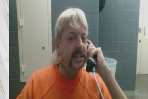 PHOTO Joe Exotic On The Phone In Jail