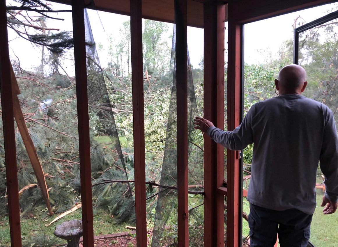 PHOTO Man Looking At Destruction Of His Backyard From Inside His House In Laurel Mississippi