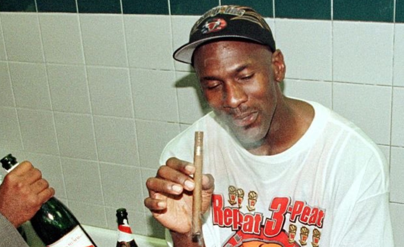 PHOTO Michael Jordan Smoking Huge Cigar In Bulls Locker Room After Winning Title
