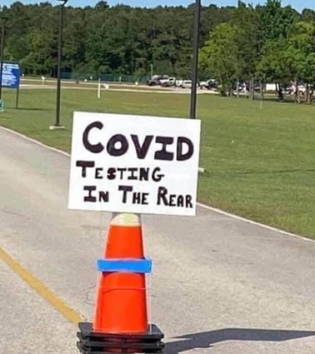 PHOTO COVID Testing In The Rear Sign At One Testing Center