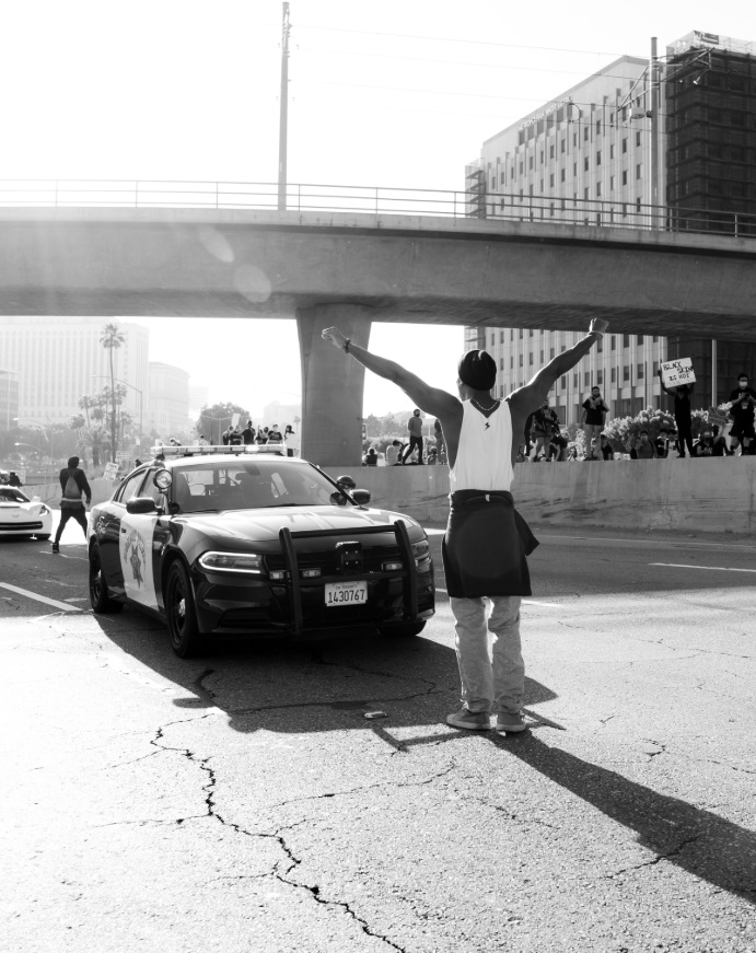 PHOTO Man Stands In Front Of CHP Car In Los Angeles On Freeway