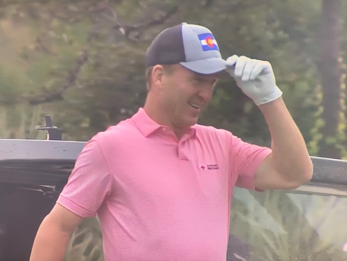 PHOTO Peyton Manning Switches To Colorado Flag Hat During The Match