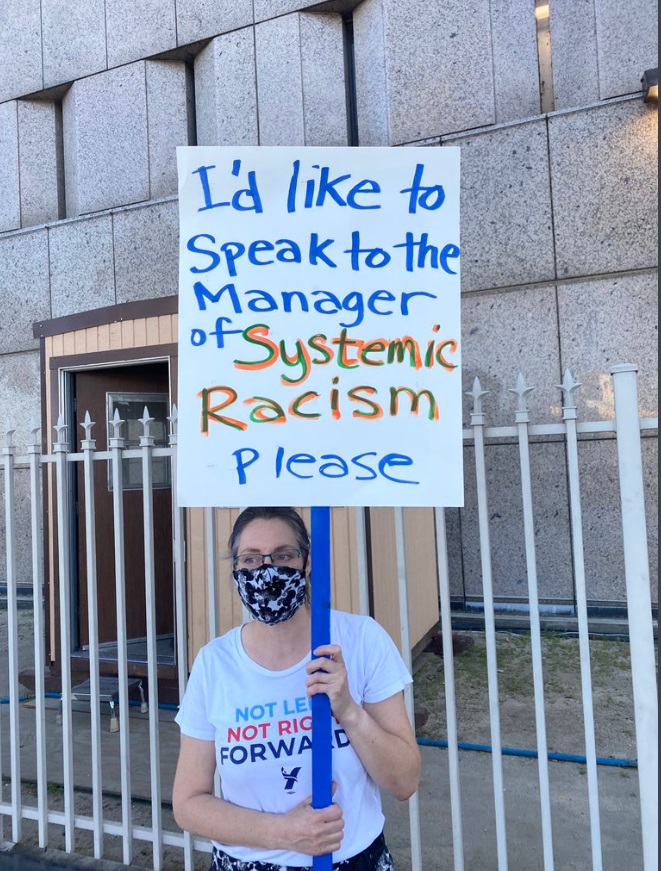 PHOTO Protester In LA With Sign That Says I'd Like To Speak To The Manager Of Systemic Racism Please