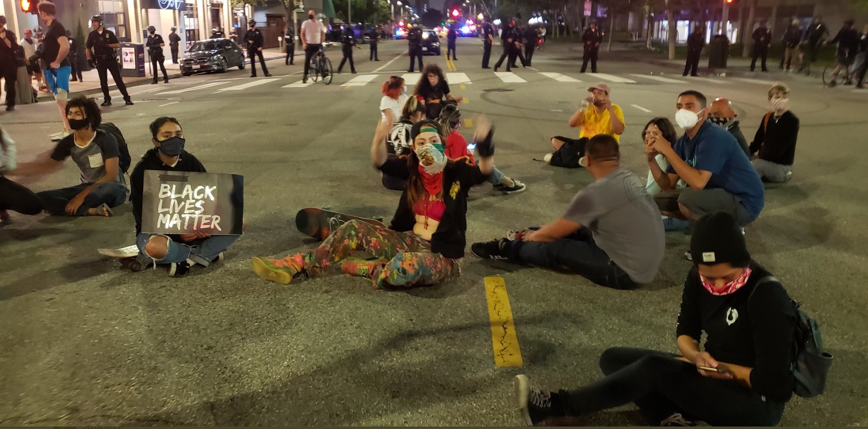 PHOTO Protesters Sitting In The Road In Downtown Los Angeles