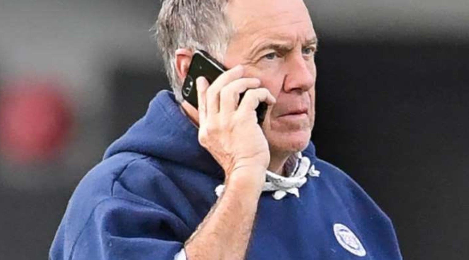 PHOTO Rare Picture Of Bill Belichick Using His iPhone To Spy On People