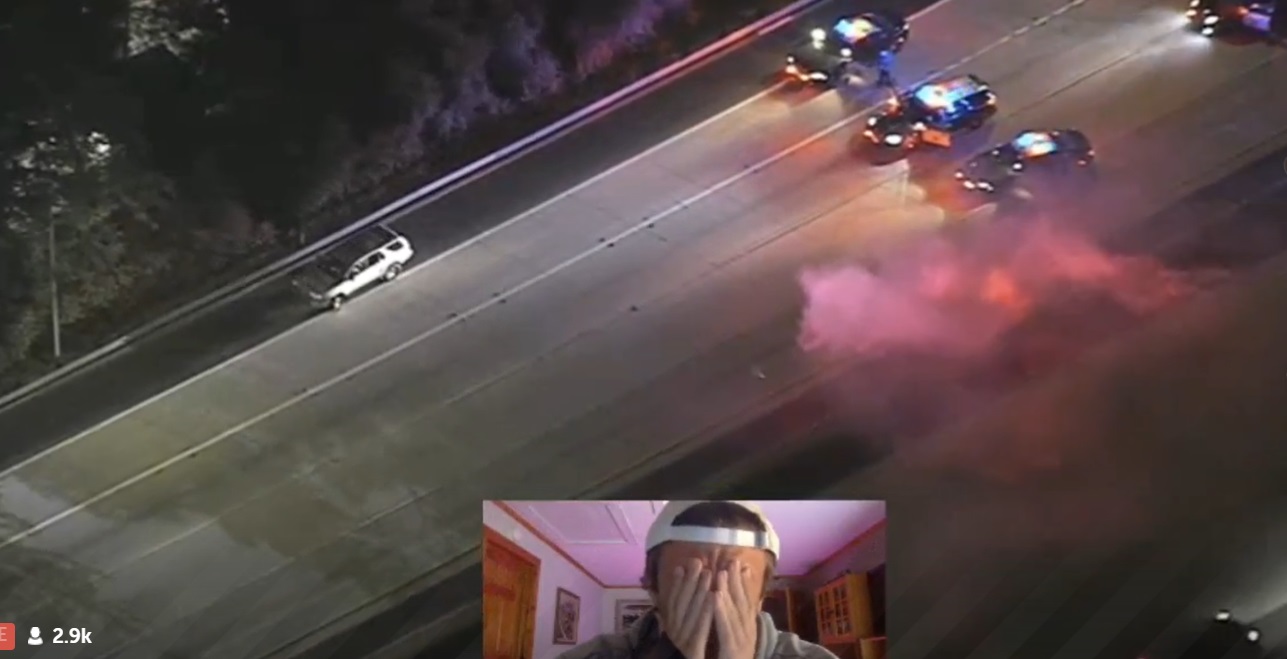 PHOTO Supect In LA Police Chase Throws Lit Flare Out Window At Police