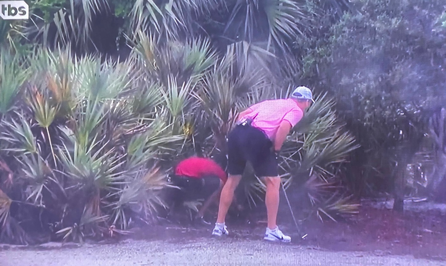 PHOTO Tiger Woods In The Rough Looking For Peyton Manning's Ball