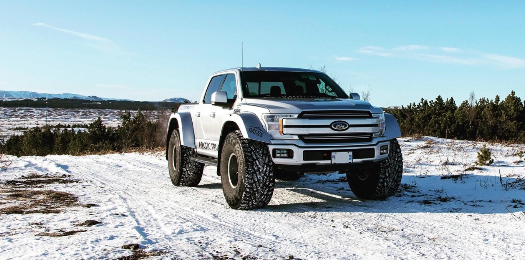 PHOTO 2021 Ford F-150 With Oversized Tires Built To Drive Through Heavy Snow Artic Truck