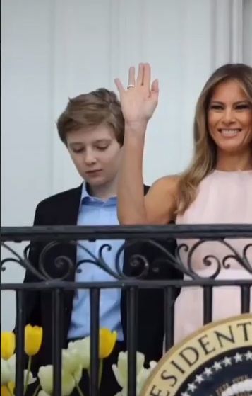 PHOTO Barron Trump Looking Down Not Wanting Attention While Melania Trump Waves