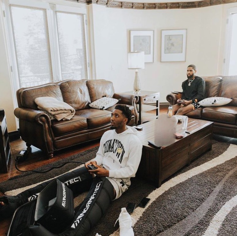 PHOTO Donovan Mitchell Playing Video Games While Icing His Legs In Quarantine