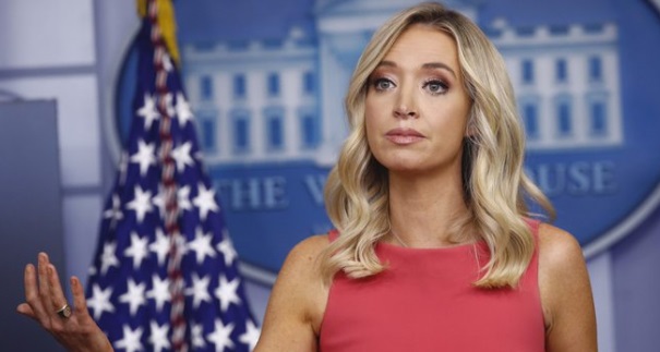 PHOTO Kayleigh McEnany Raising Her Hand Making Facial Expression Like It's Not My Problem