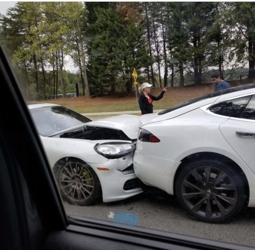 PHOTO Lady Rear Ends Tesla Model S With Her Porsche Panamara Hybrid And The Model S Is Left Without A Scratch