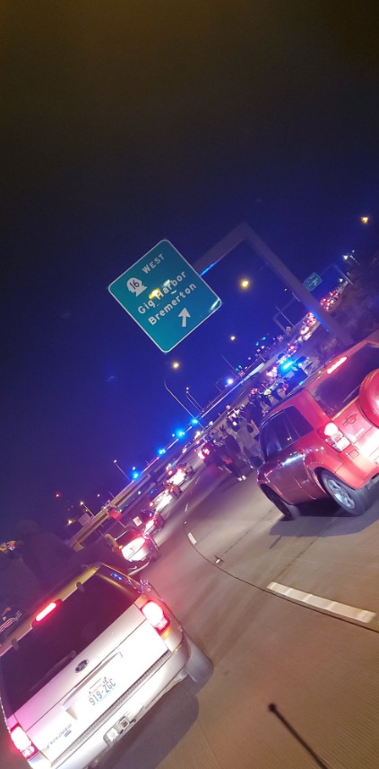 PHOTO Protesters Walking In Traffic In Tacoma Near Freeway Entrance